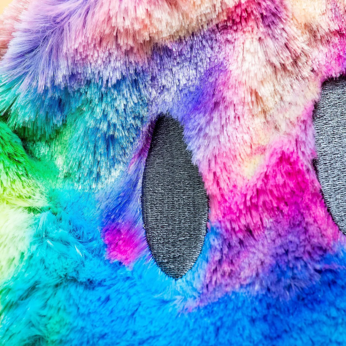 Regenboog smiley warmtekussen